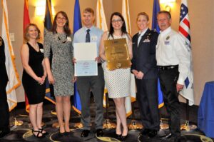 From left to right, Ana Drilea, Laura Hafner, Jeff Metzger, Shana Loven and Jennifer Armstrong accept the Pro Patria Award and Top 30 Finalist certificate from Joel Scott of the WA State ESGR (right).